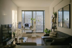 Sunlit living room with desk