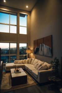 Grey chaise beside window