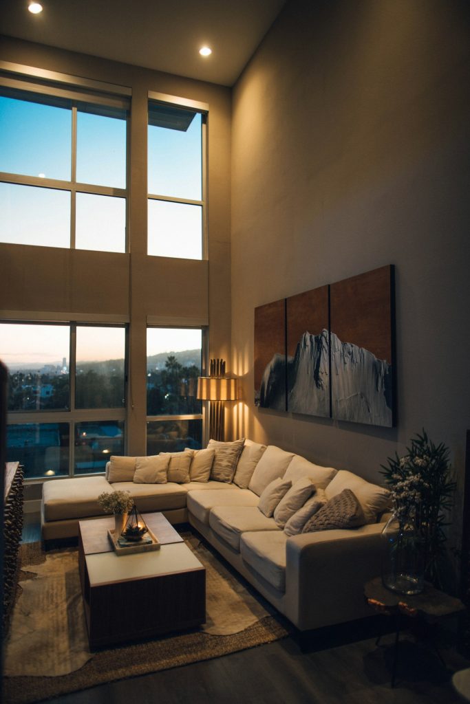 Grey chaise beside window