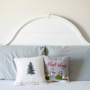 Bed with white headboard