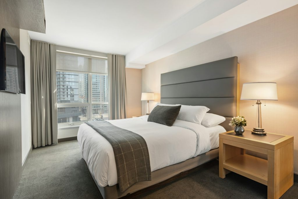 Hotel bed with white linen