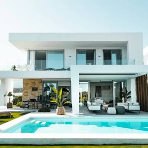 Modern villa with pool and lounge area
